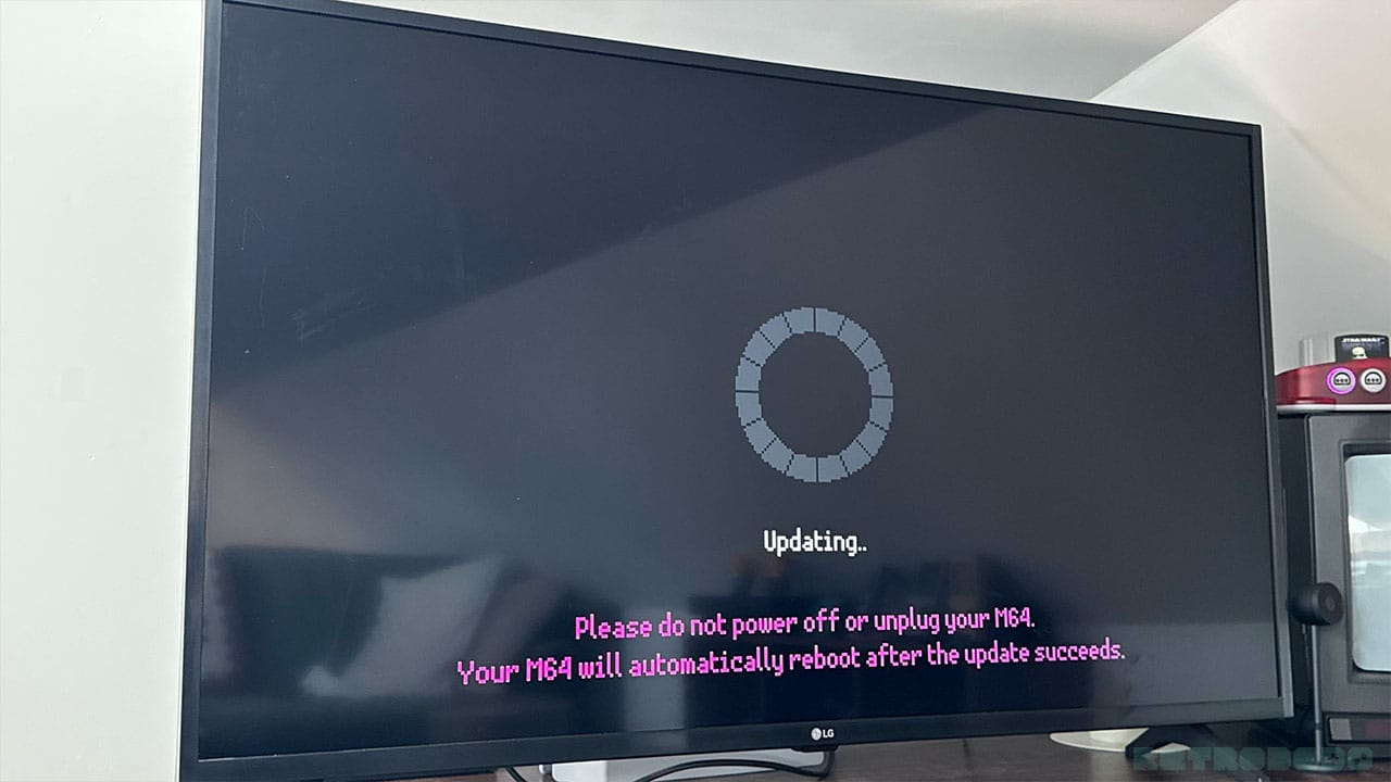 Updating the console via WiFi, with an updating circle on the screen