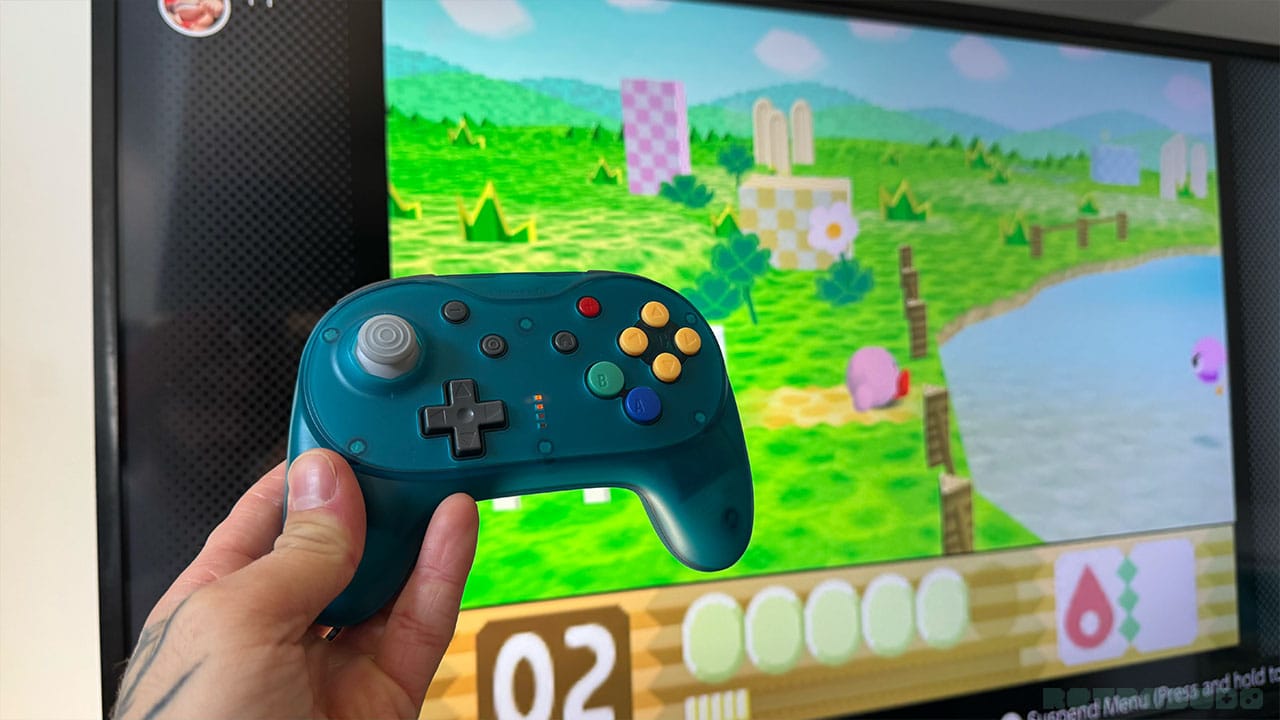 Blue controller next to Kirby 64