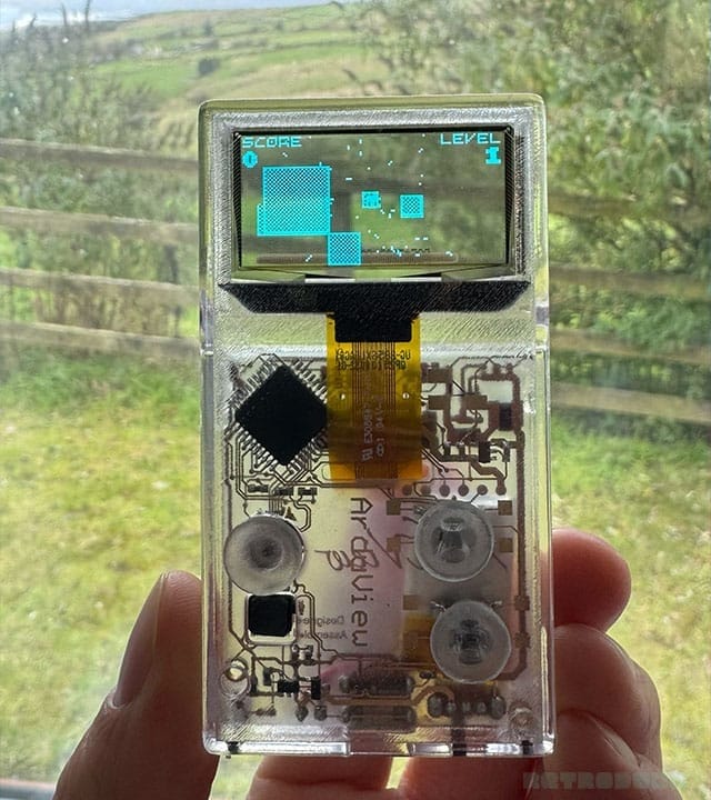 Looking through the handheld to a field outside