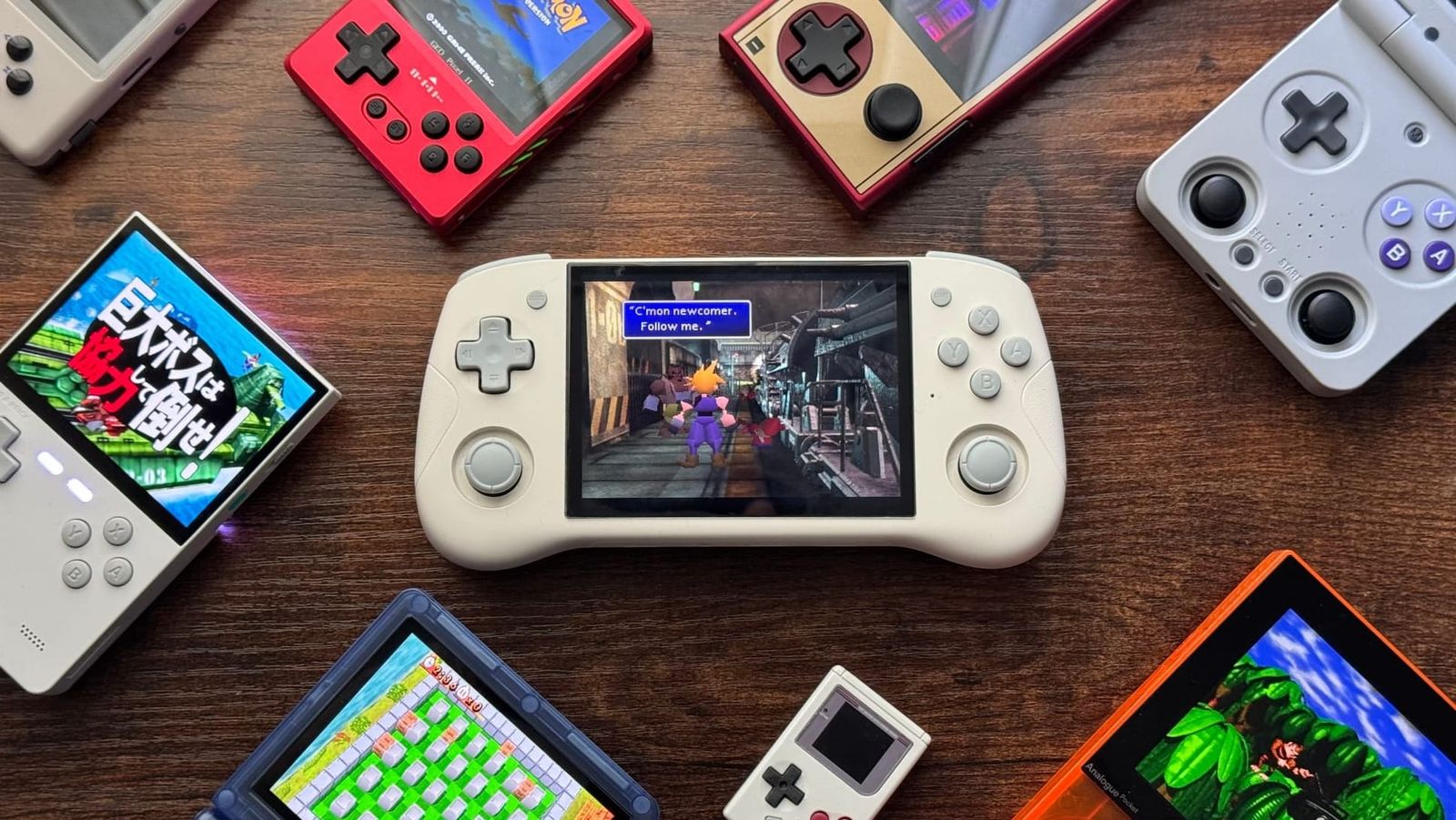 Helegaly Action π surrounded by handhelds on Seb's desk