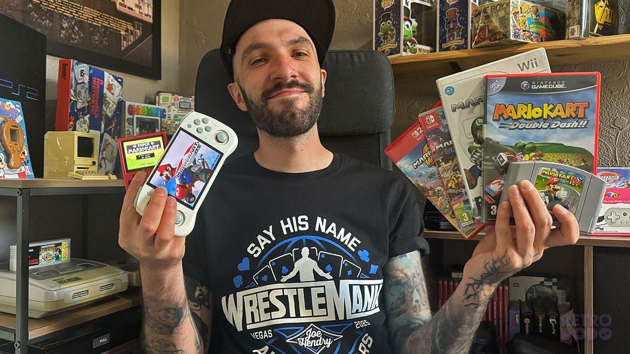 Seb holding Mario Kart games