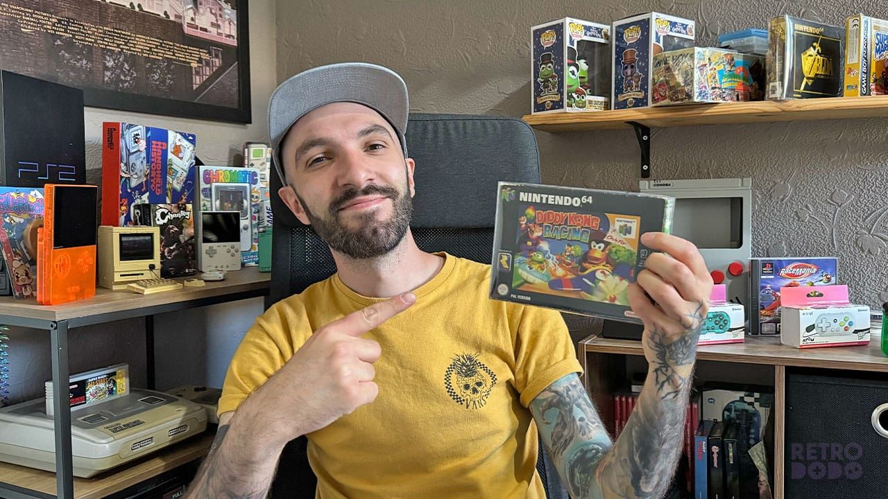 Seb holding the Diddy Kong Racing box