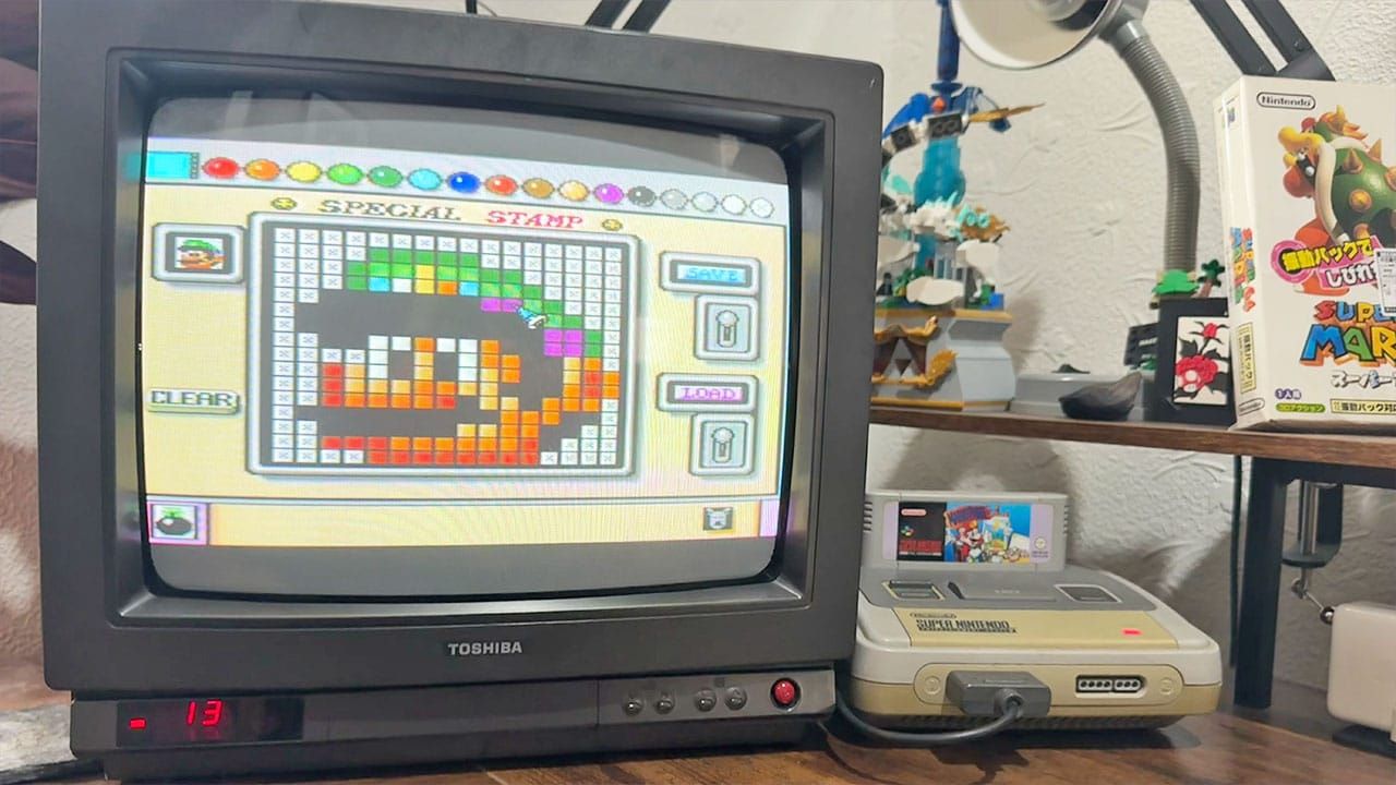 Mario Paint with a stamp maker on the screen
