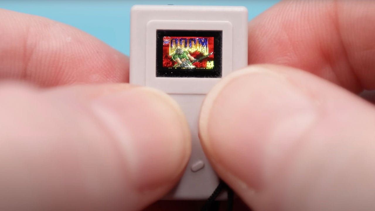A close up of the Thumby with a color screen