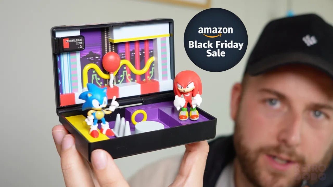 Brandon holding a Console Heroes SEGA Diorama