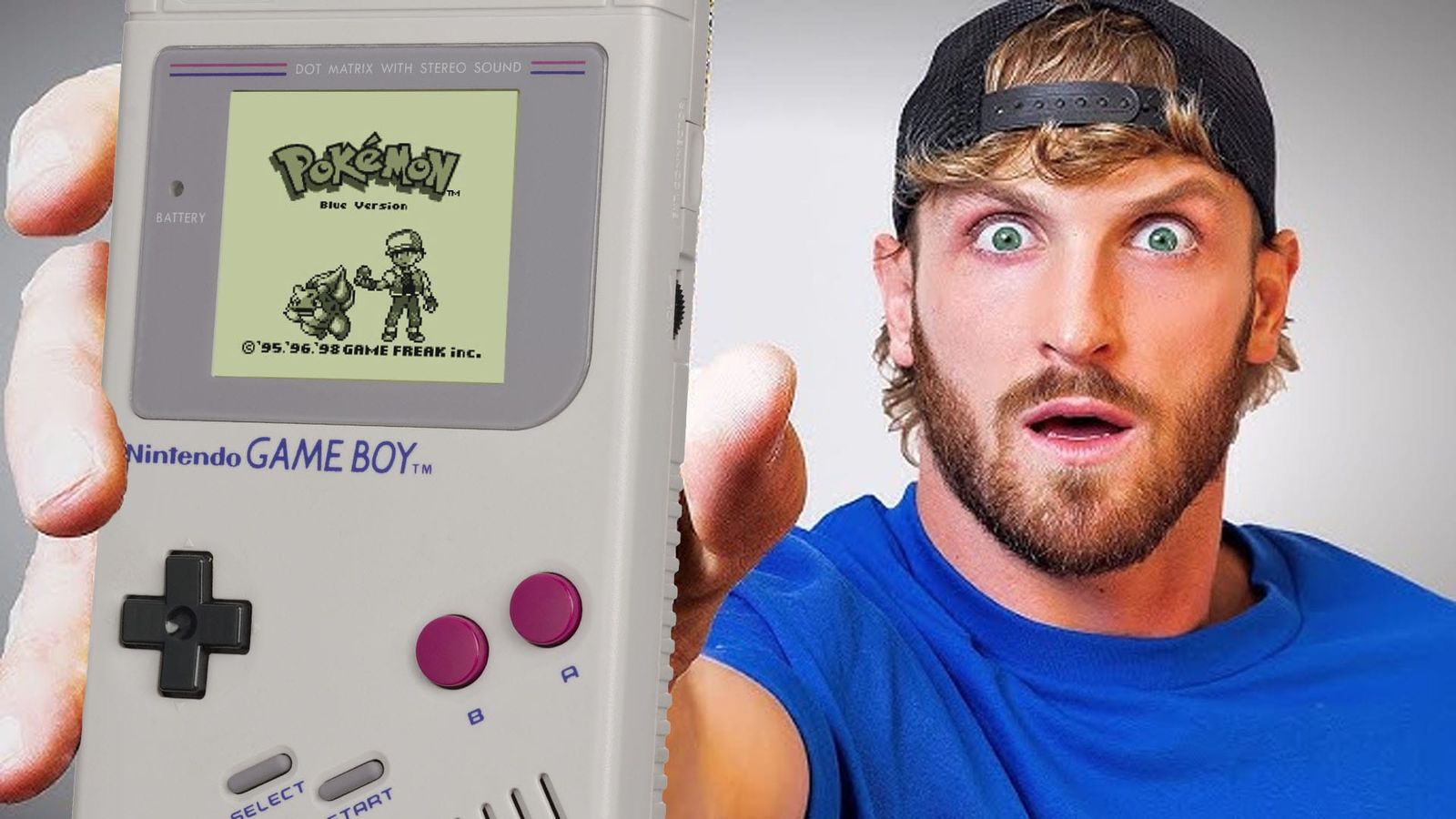 Logan Paul holding a Gameboy with Pokémon Red on the screen