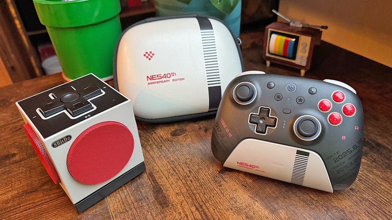 Two items from the N40 collection from 8BitDo with a carry case on a wooden desk