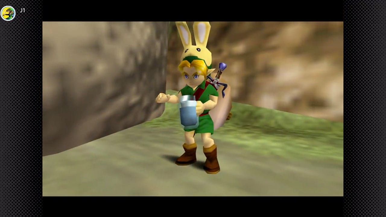 Link pouring water on a boulder