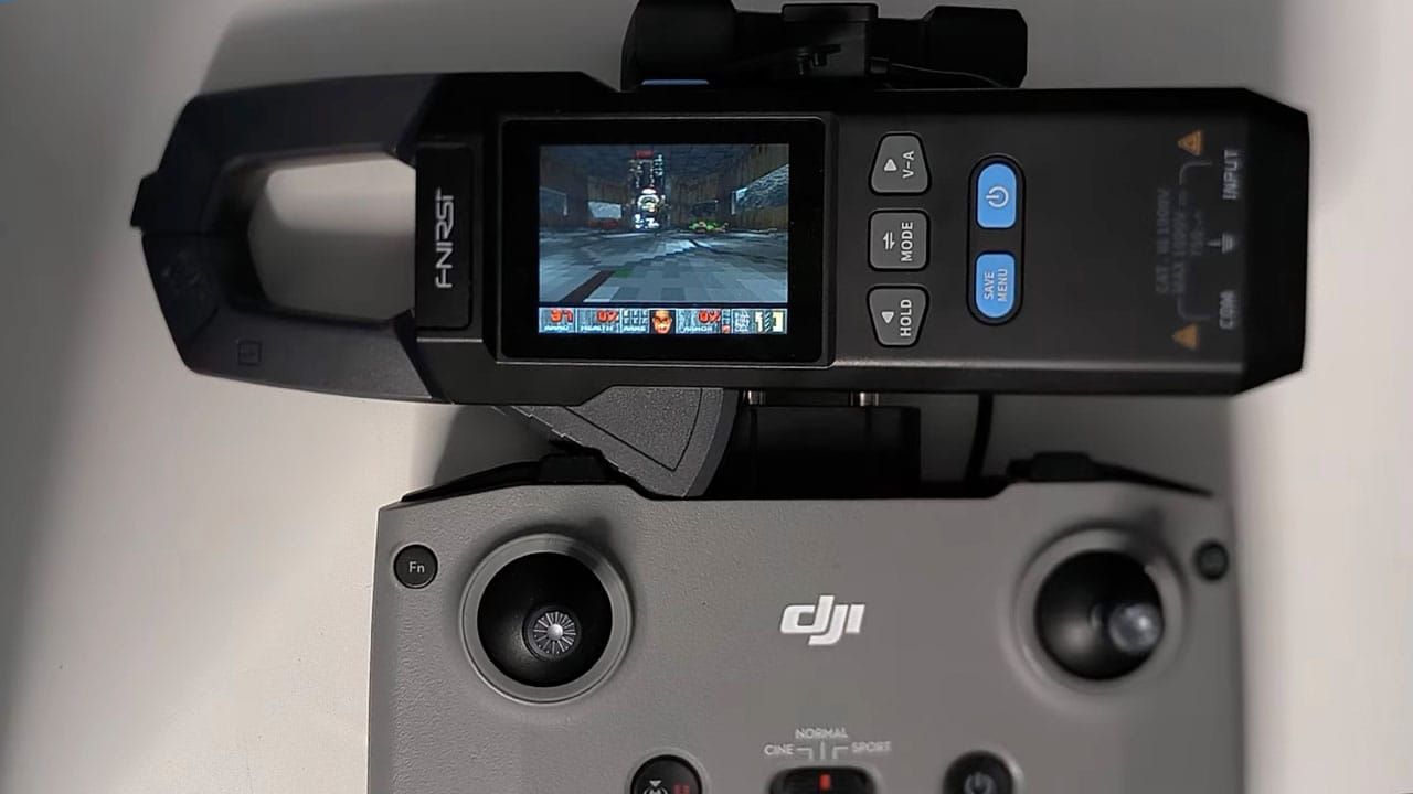Doom running on a multimeter, powered by a DJI controller
