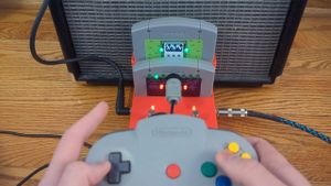 Thomas playing guitar sounds with an N64 controller
