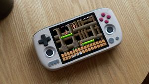 Super Mario ROM hack on a handheld