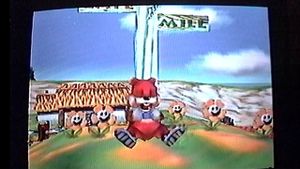 Conker sleeping by a sign