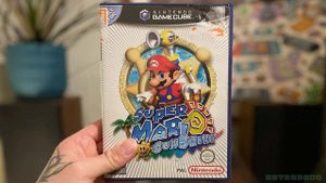 Seb holding his copy of Super Mario Sunshine