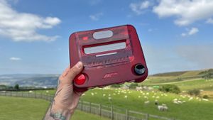 M64 (red) held up in the air above a field