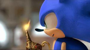 Sonic holding a lamp which has a flame coming out of it
