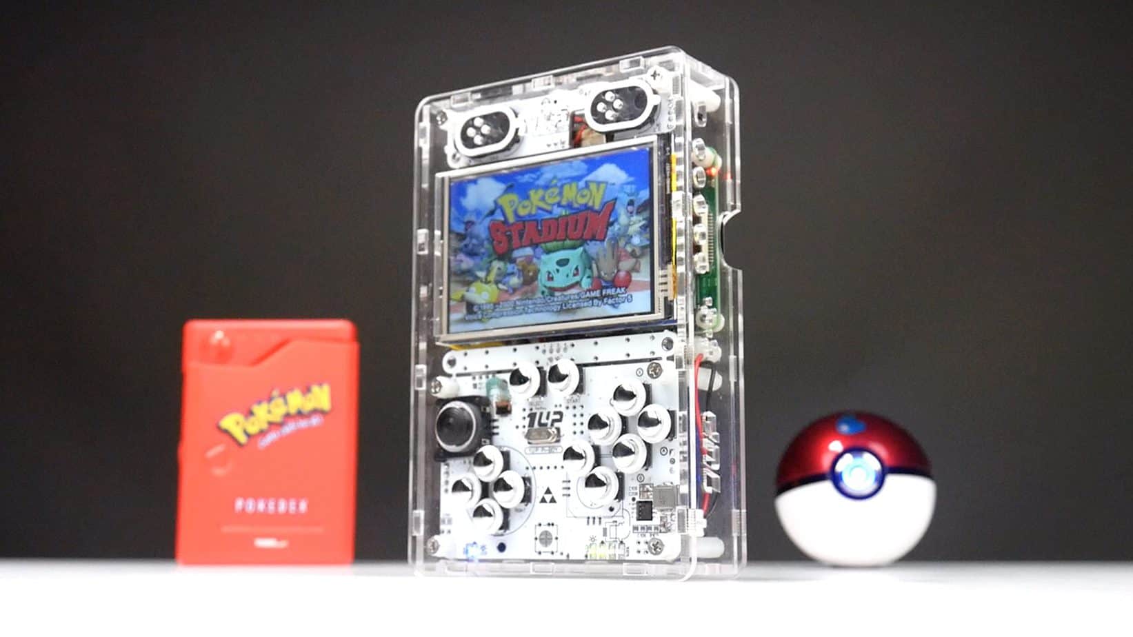 Gameboy 1UP next to a Pokedex and Pokeball