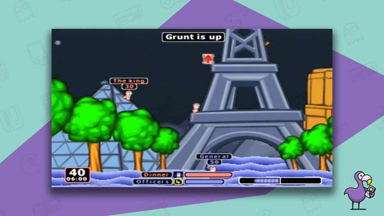 Worms : Armageddon gameplay, with worms battling around a scene that bears resemblance to Paris with the Eiffel Tower and Louvre.