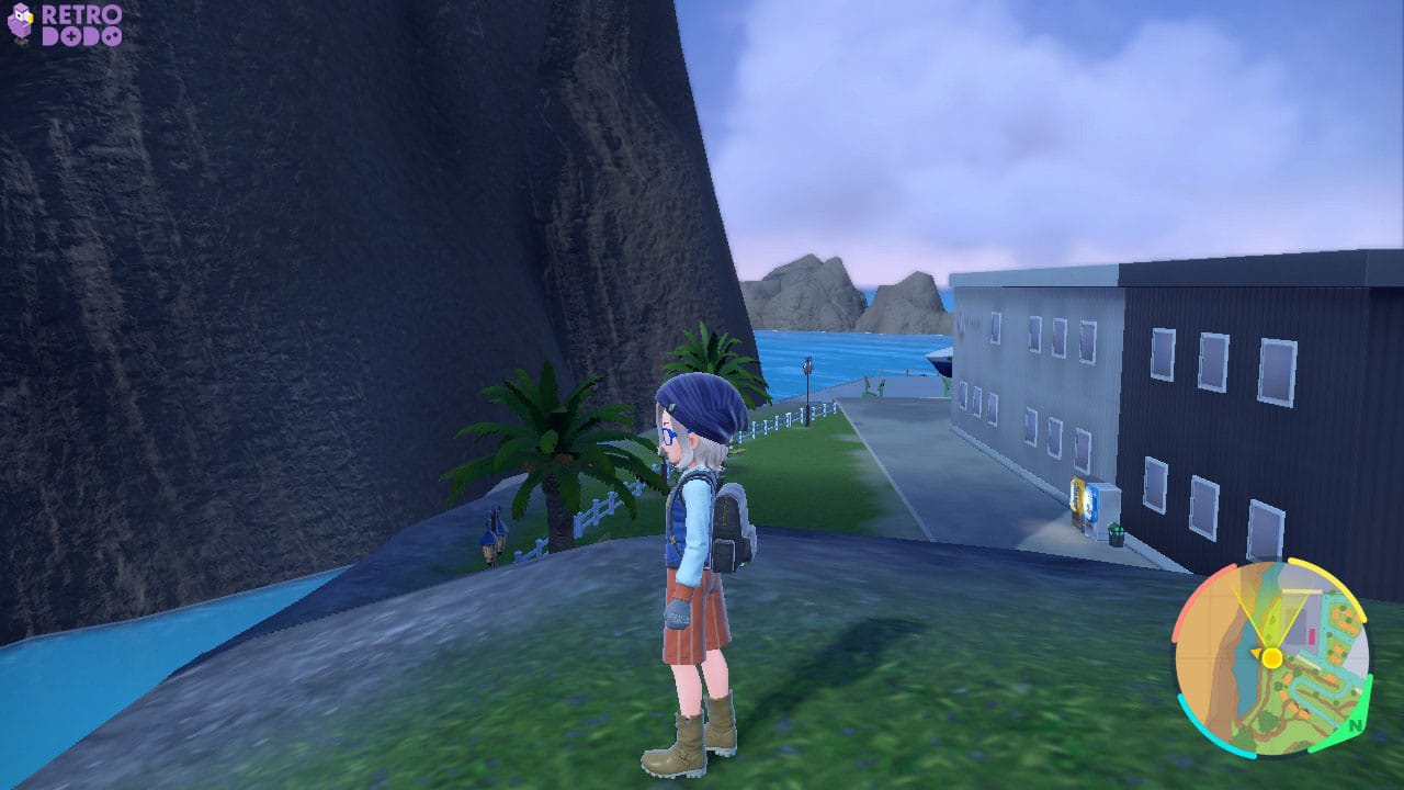 Character standing on a hill near a river