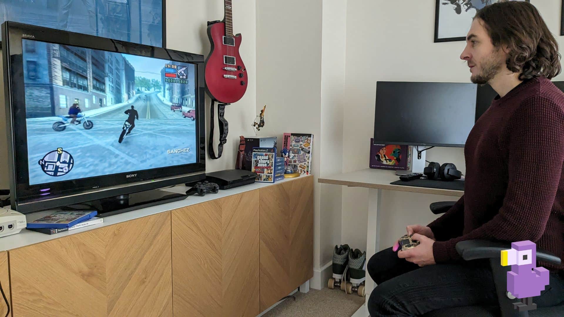 Theo enjoying Grand Theft Auto: Liberty City Stories (2005)