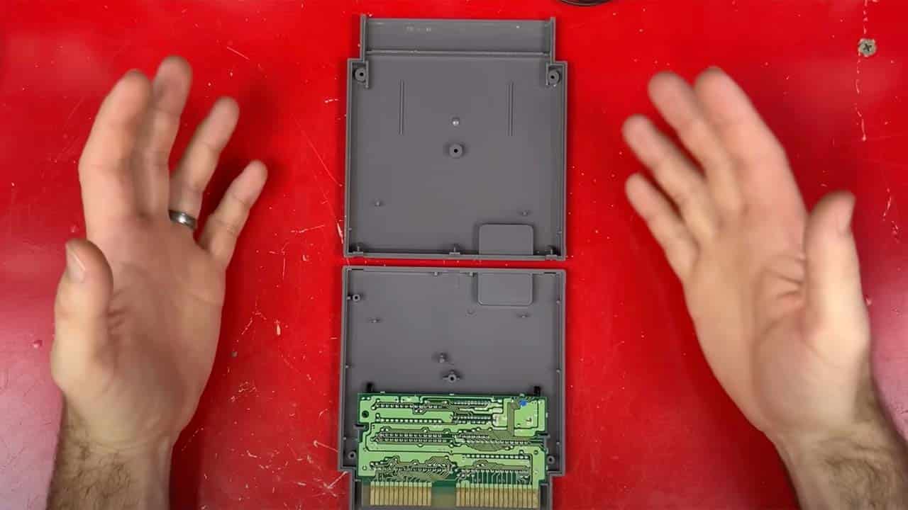 The empty space inside of a NES cartridge, showing two thirds of the cartridge empty