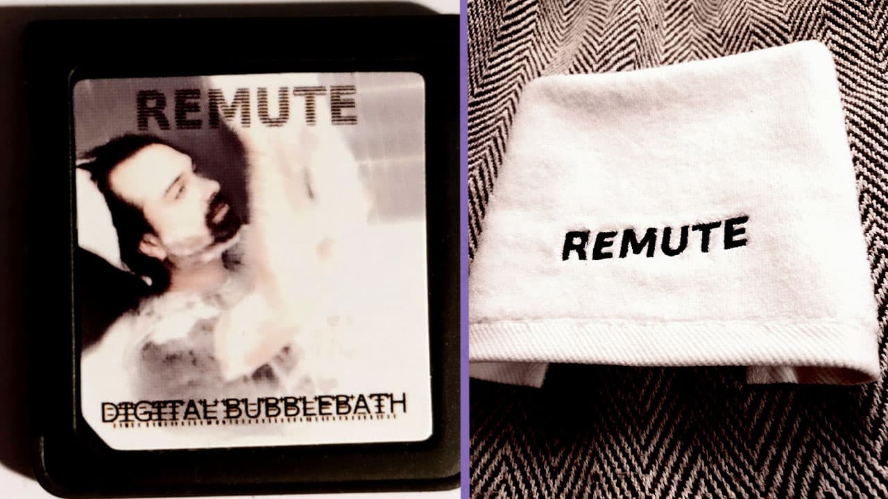 Remute's DS cartridge (right) and limited edition towel (right)