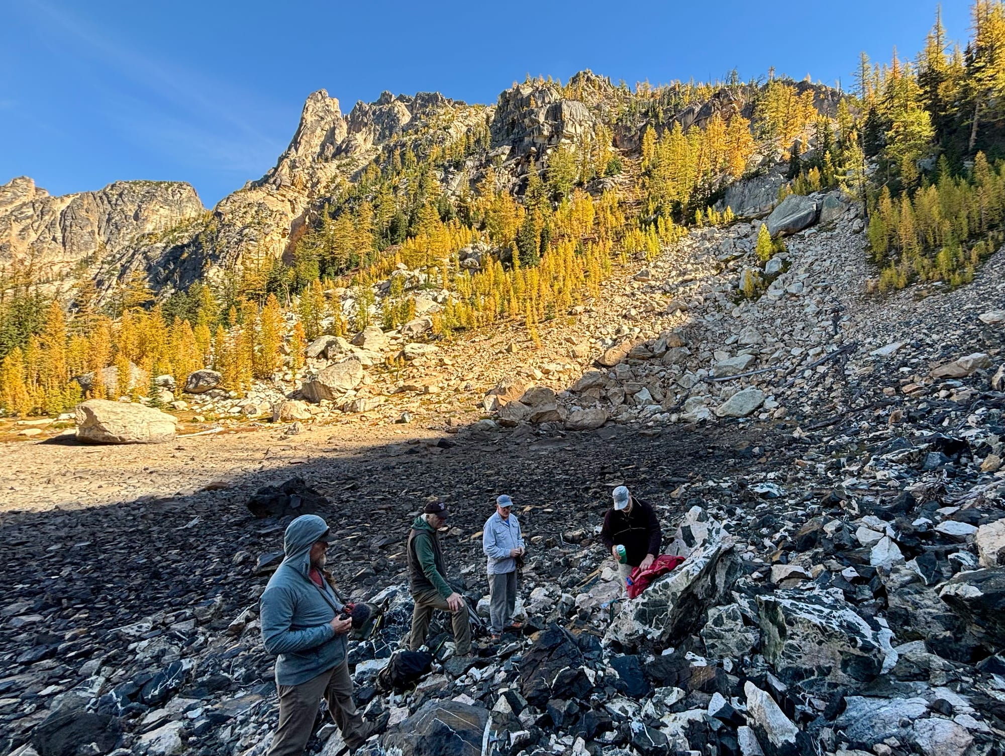 geologists looking at rocks