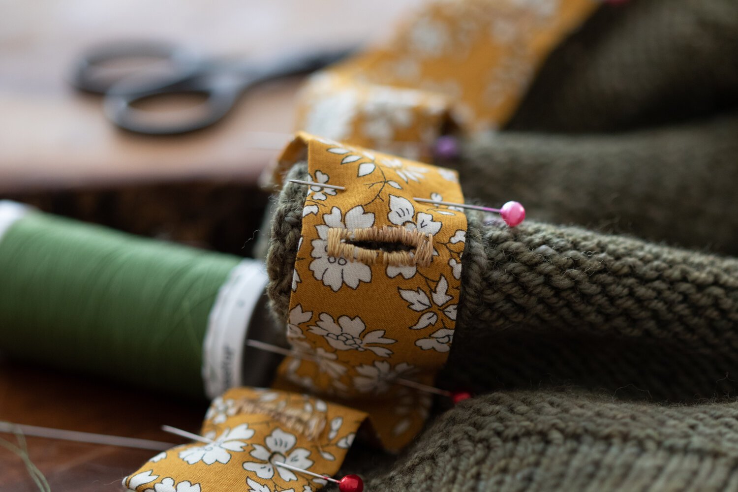  Hand-sewn buttonholes for baby Nora’s cardigan. 