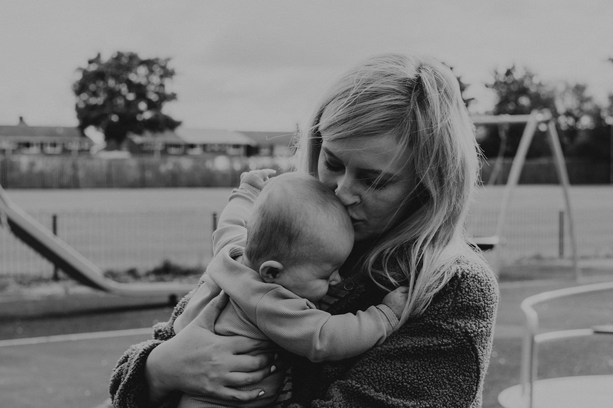 a person holding a baby