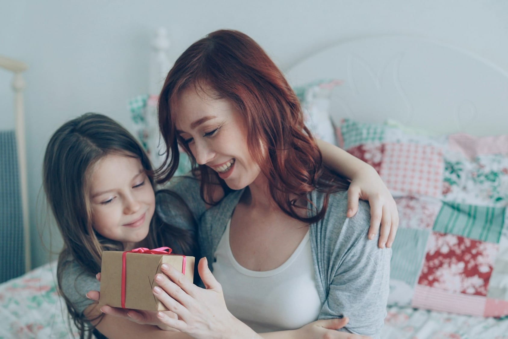 A daughter gifts her mother.