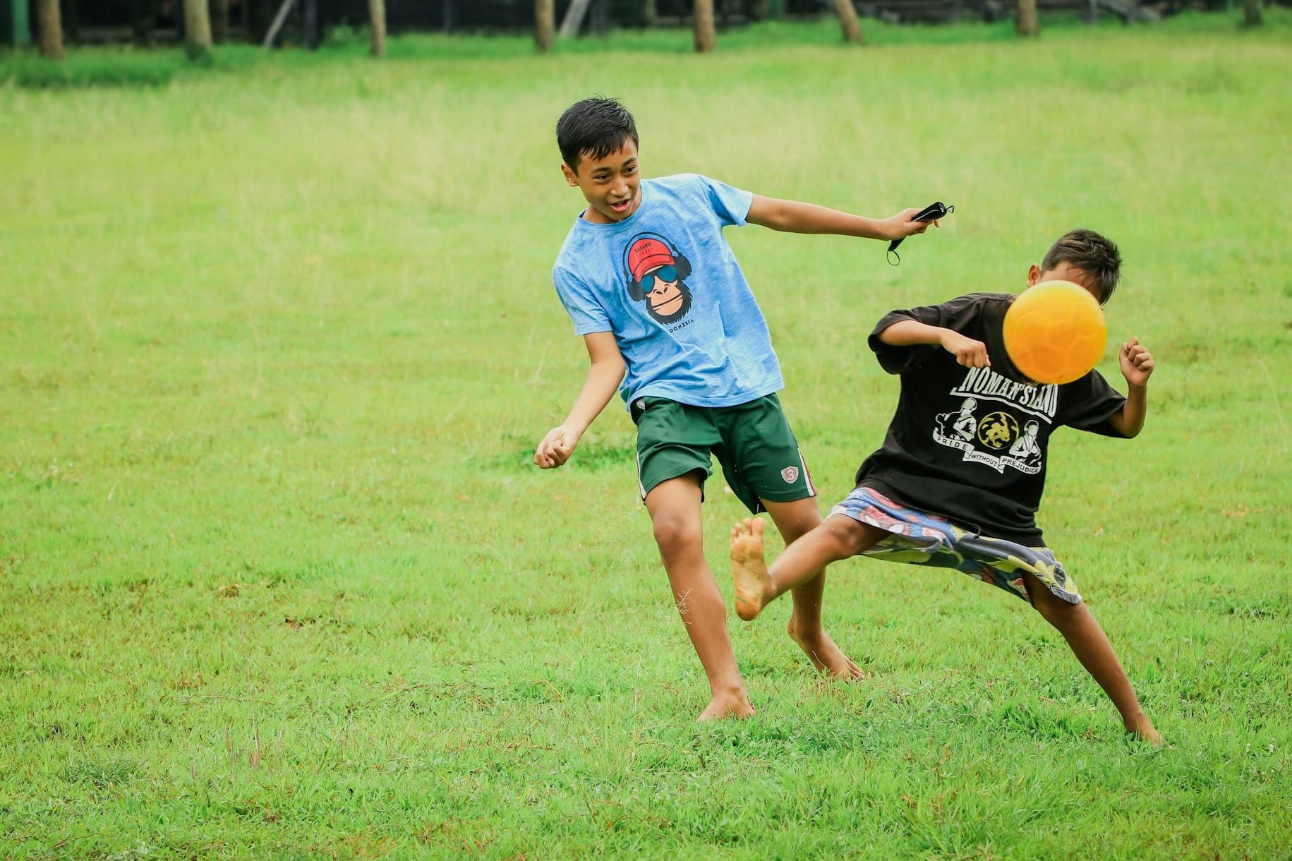 a couple of young men playing a game of frisbee