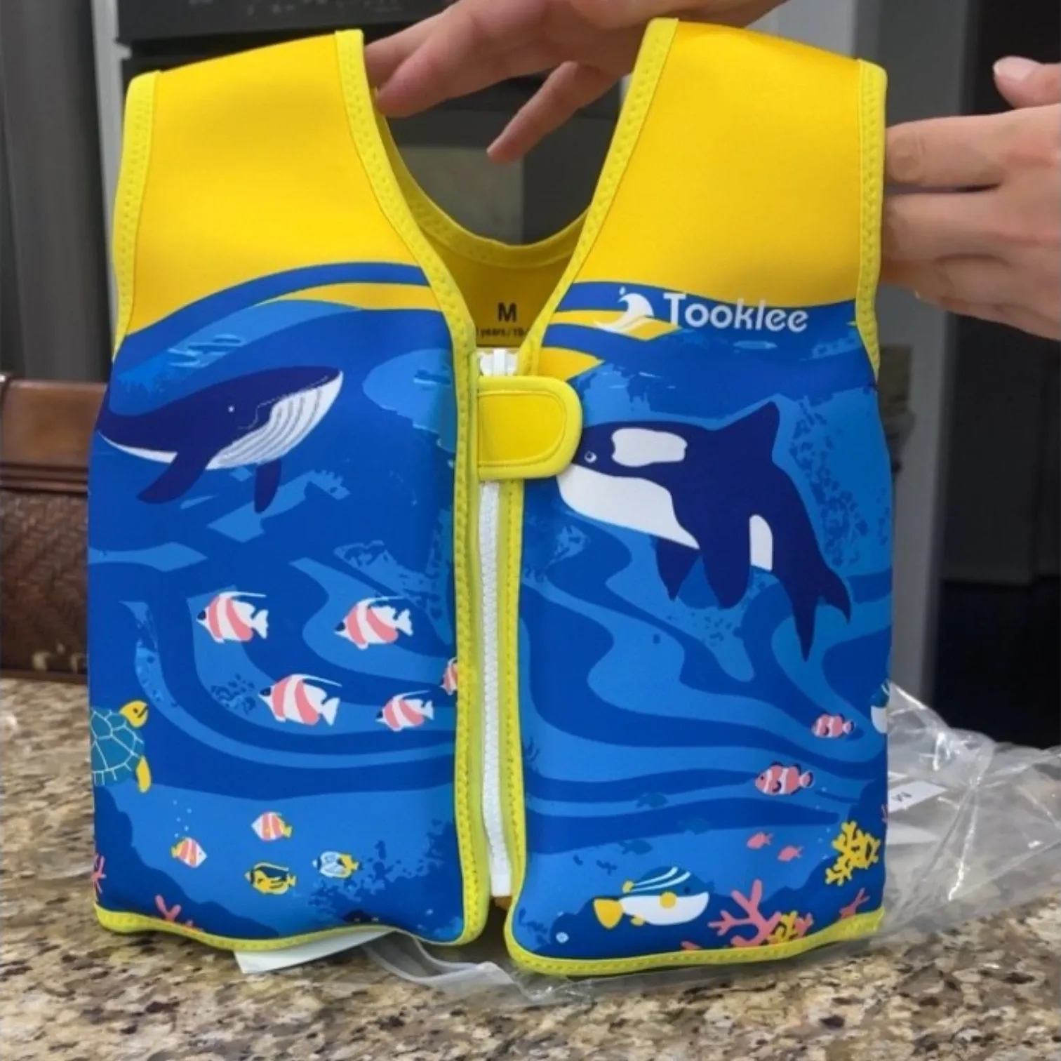 The Tooklee kids swim vest shown as the main product photo.