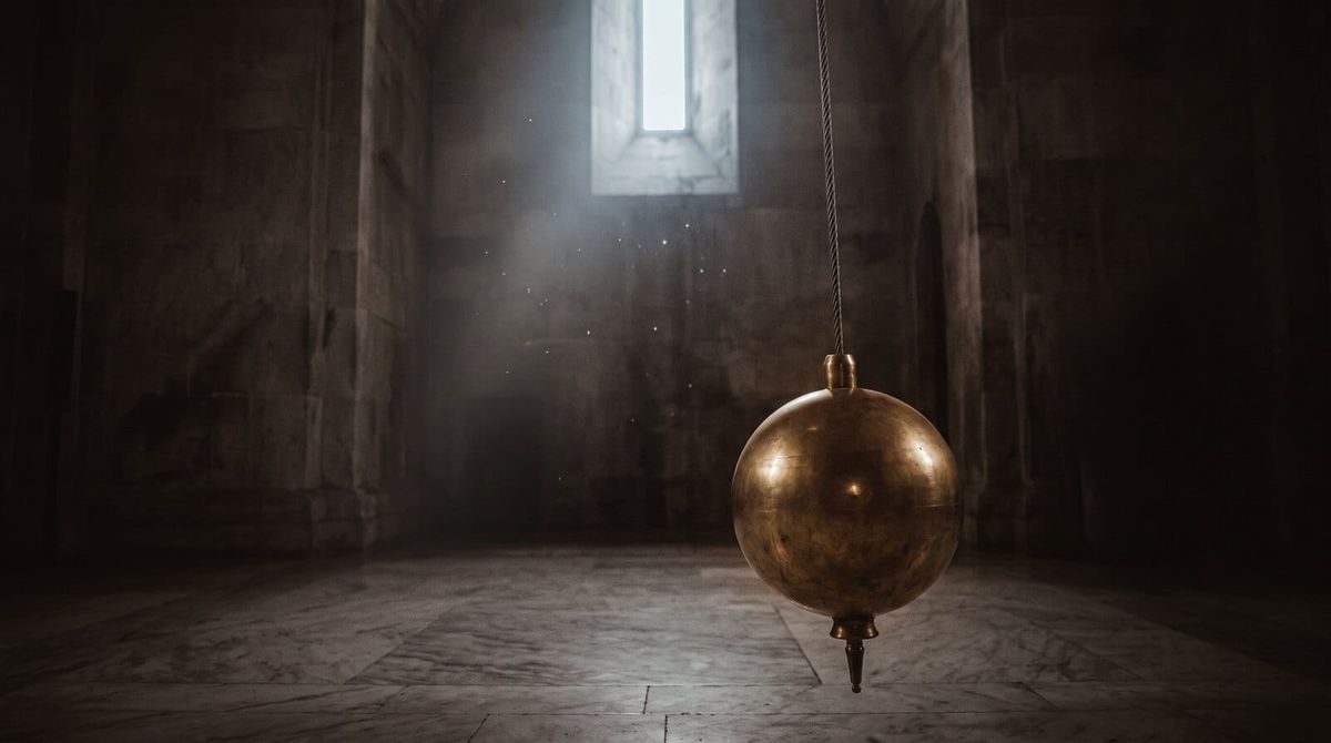 A large brass pendulum hanging perfectly still in a vast dark hall, dust suspended in one shaft of pale light.