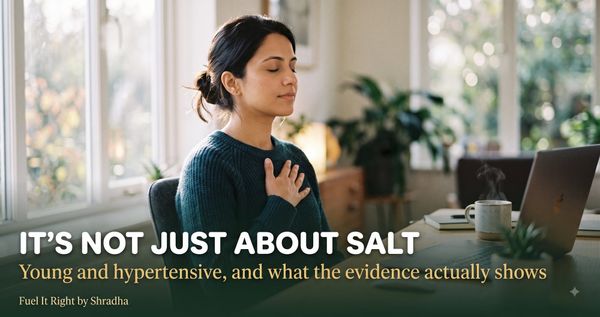 Photorealistic photo of a young professional taking a slow breath at their desk with eyes closed, calm expression, with headline "Young and Hypertensive: It's Not Just About Salt"