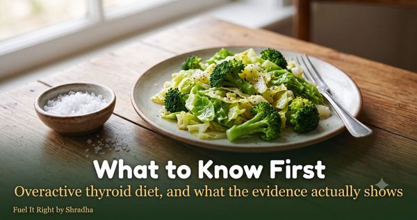 Photorealistic photo of cooked cabbage and broccoli beside a small bowl of rock salt on a kitchen counter, with headline "Overactive Thyroid Diet: What to Know First"