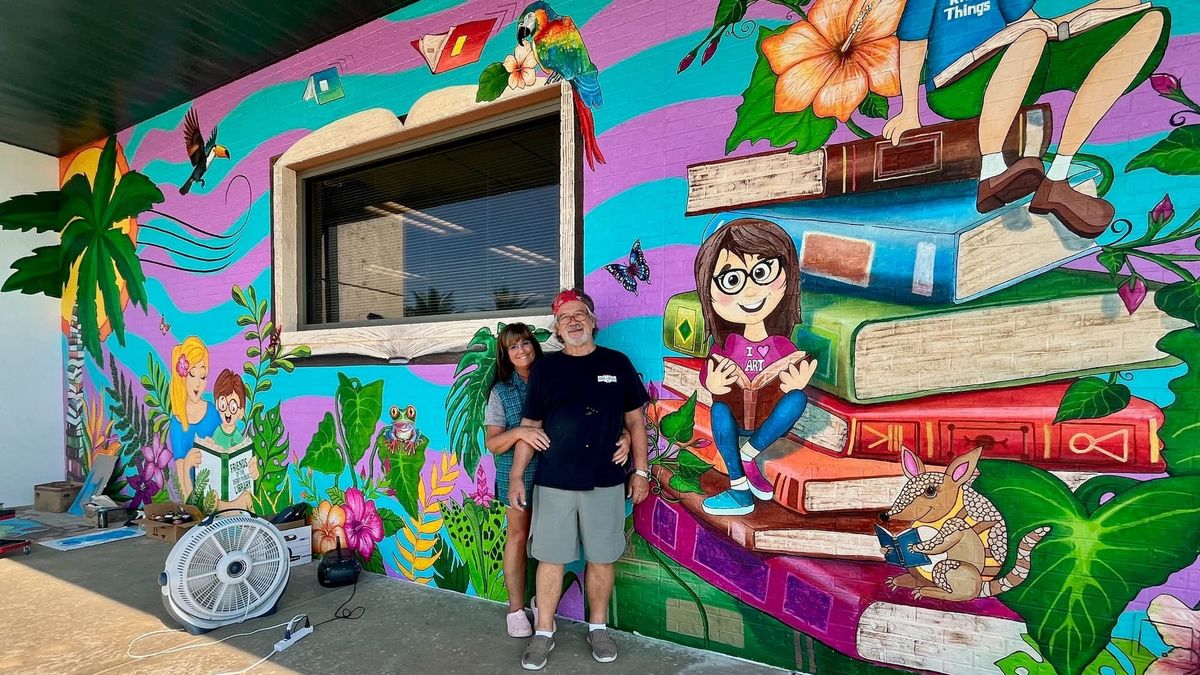 Derby Public Library opens its new pocket park, palm trees and all