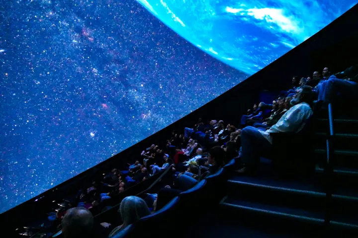 𝗔𝗻 𝗮𝘀𝘁𝗿𝗼𝗻𝗼𝗺𝗲𝗿’𝘀 𝘀𝘁𝗼𝗿𝘆 𝘄𝗶𝗹𝗹 𝗽𝗹𝗮𝘆 𝗼𝘂𝘁 𝘂𝗻𝗱𝗲𝗿 𝘁𝗵𝗲 𝘀𝘁𝗮𝗿𝗿𝘆 𝘀𝗸𝗶𝗲𝘀 𝗼𝗳 𝗘𝘅𝗽𝗹𝗼𝗿𝗮𝘁𝗶𝗼𝗻 𝗣𝗹𝗮𝗰𝗲’𝘀 𝗗𝗼𝗺𝗲 𝗧𝗵𝗲𝗮𝘁𝗲𝗿