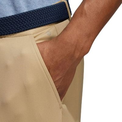 adidas Golf Ultimate365 Primegreen Golf Trousers in Hemp colour with hand in pocket