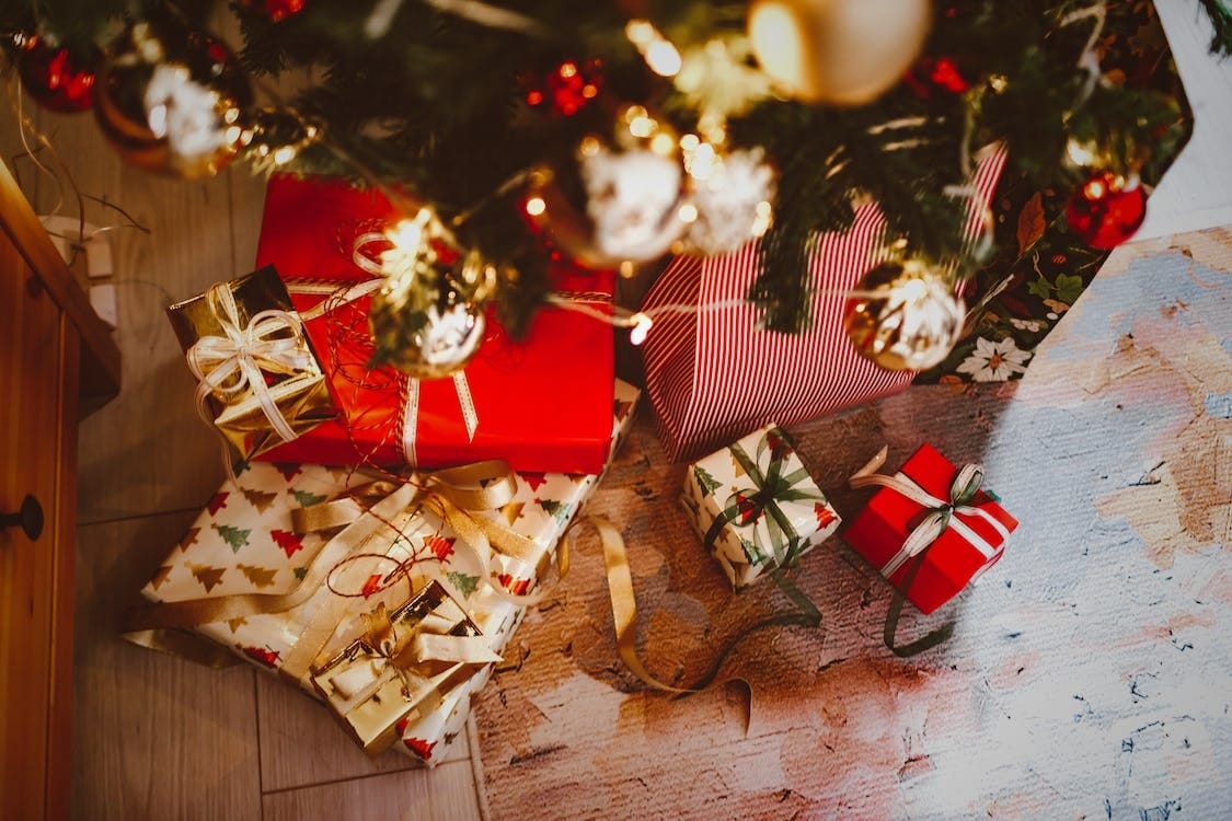 Top-down photo of presents under a Christmas tree!