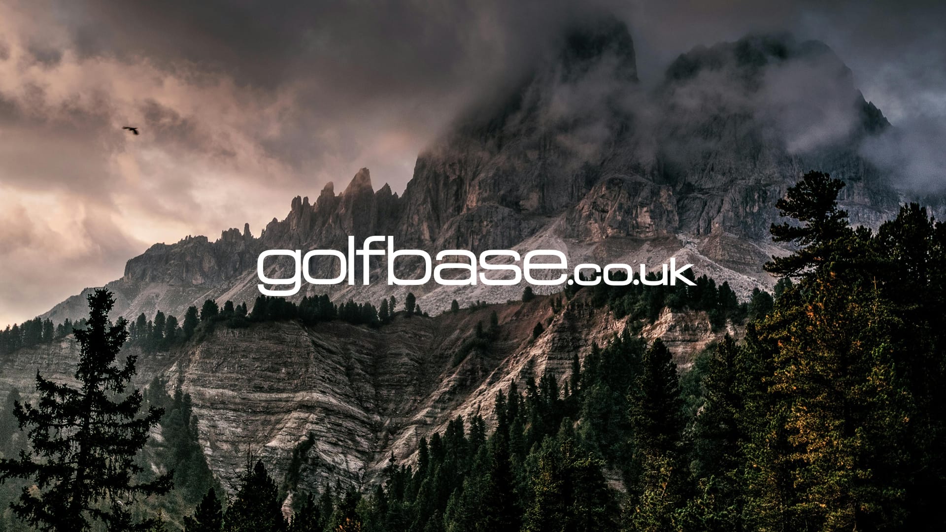 Foreboding mountain range with the Golfbase logo in the centre