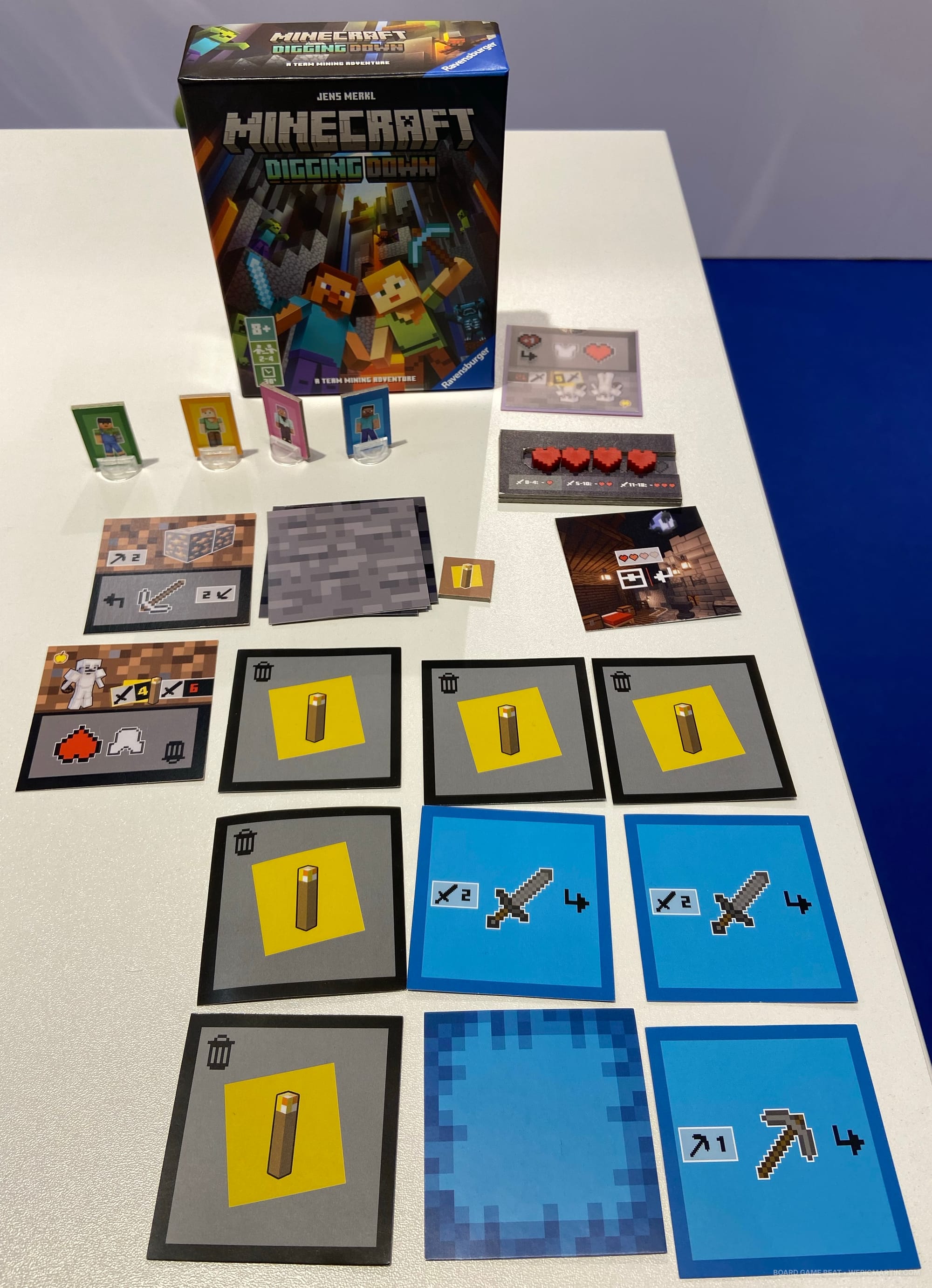 Sample cards in the card game Minecraft: Digging Down: torches, swords, picks, monsters, etc.