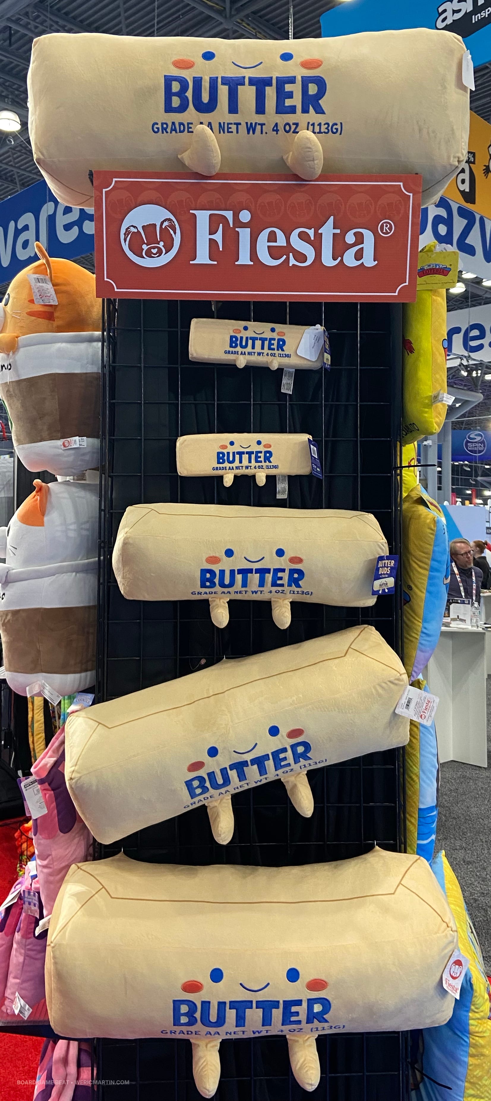 Five plush sticks of butter in different sizes