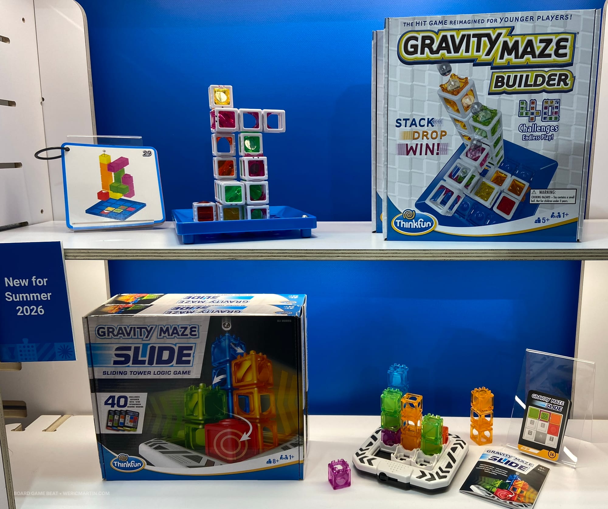 Two logic puzzles — Gravity Maze Builder and Gravity Maze Slide — each show colorful vertical towers stacked like a playground object