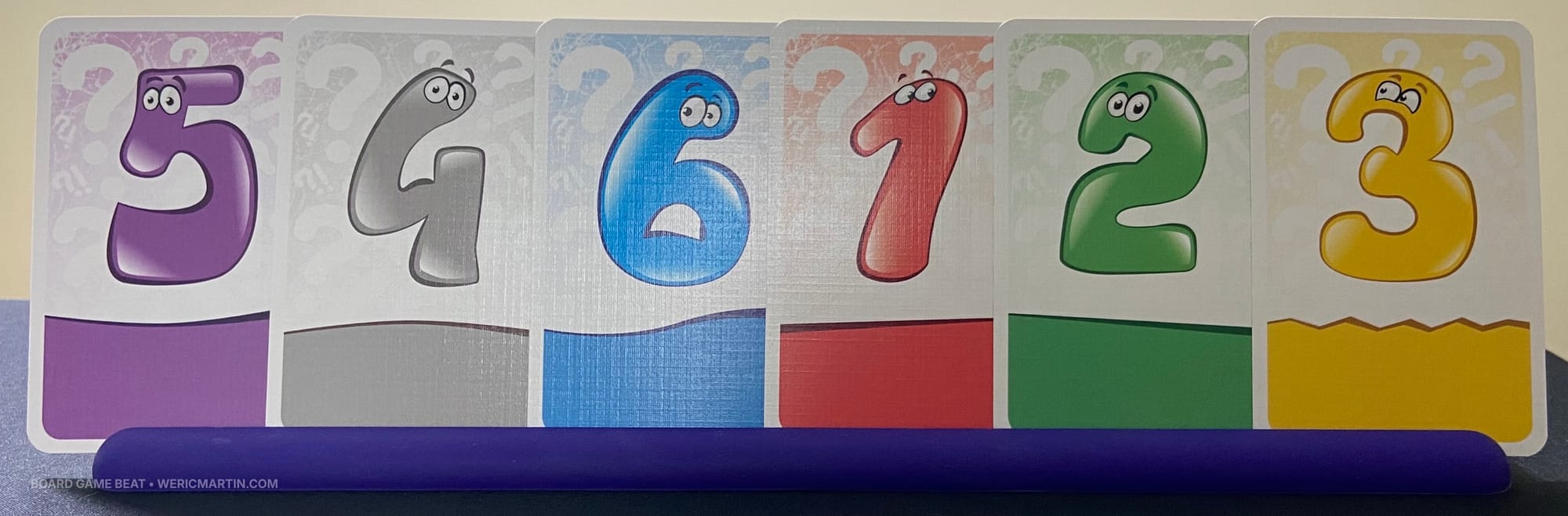 Cards showing one of each number 1-6 and one of each of the six colors