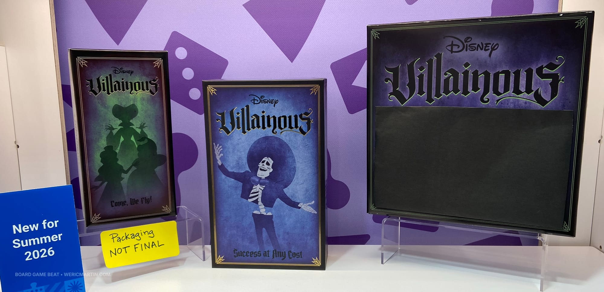 Three boxes in the Villainous game series, one bearing only a logo, and the other two featuring characters mentioned in the post below.