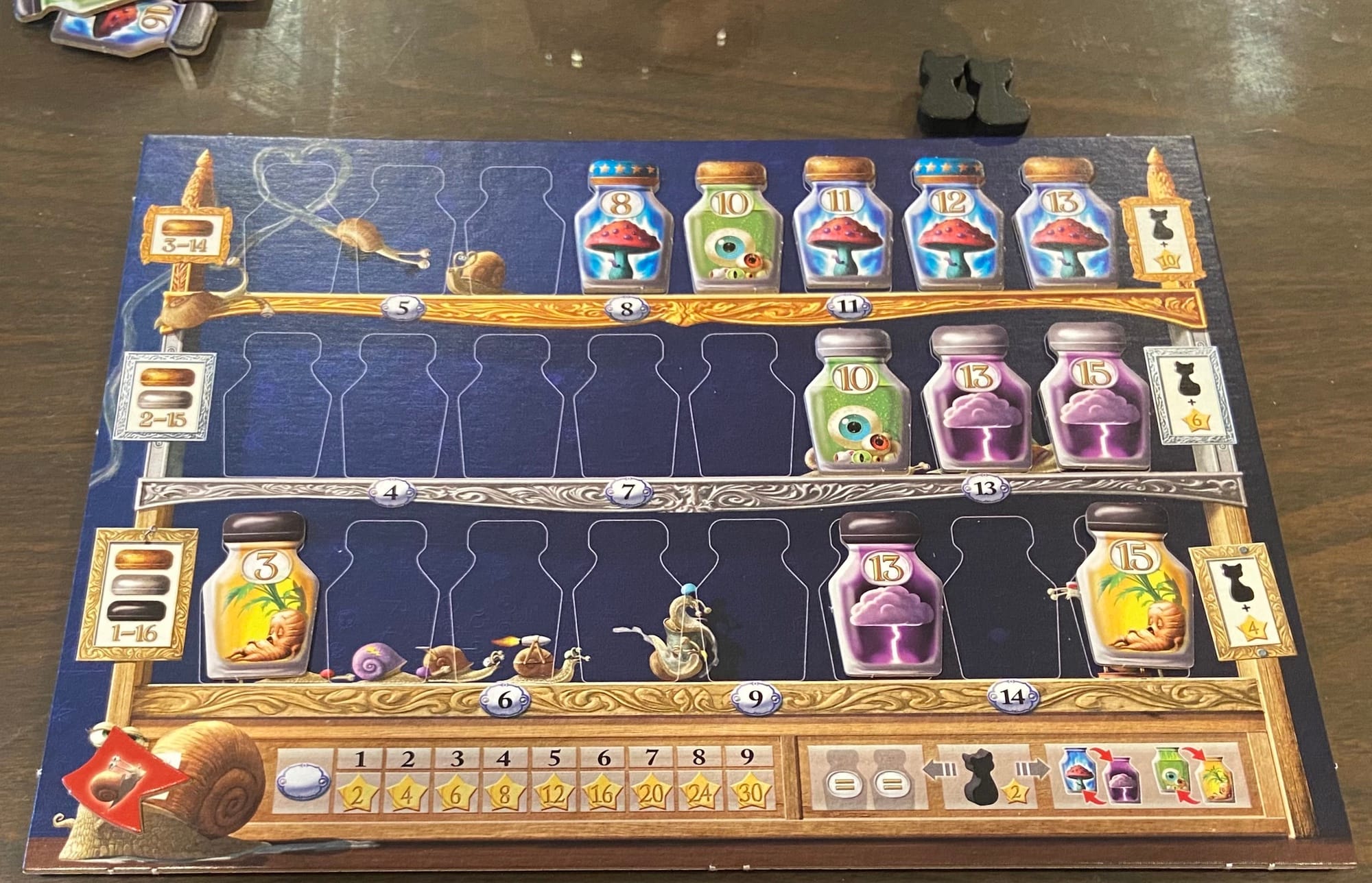 A game board shows three shelves, each with eight spaces for bottles, with bottles on some of the spaces