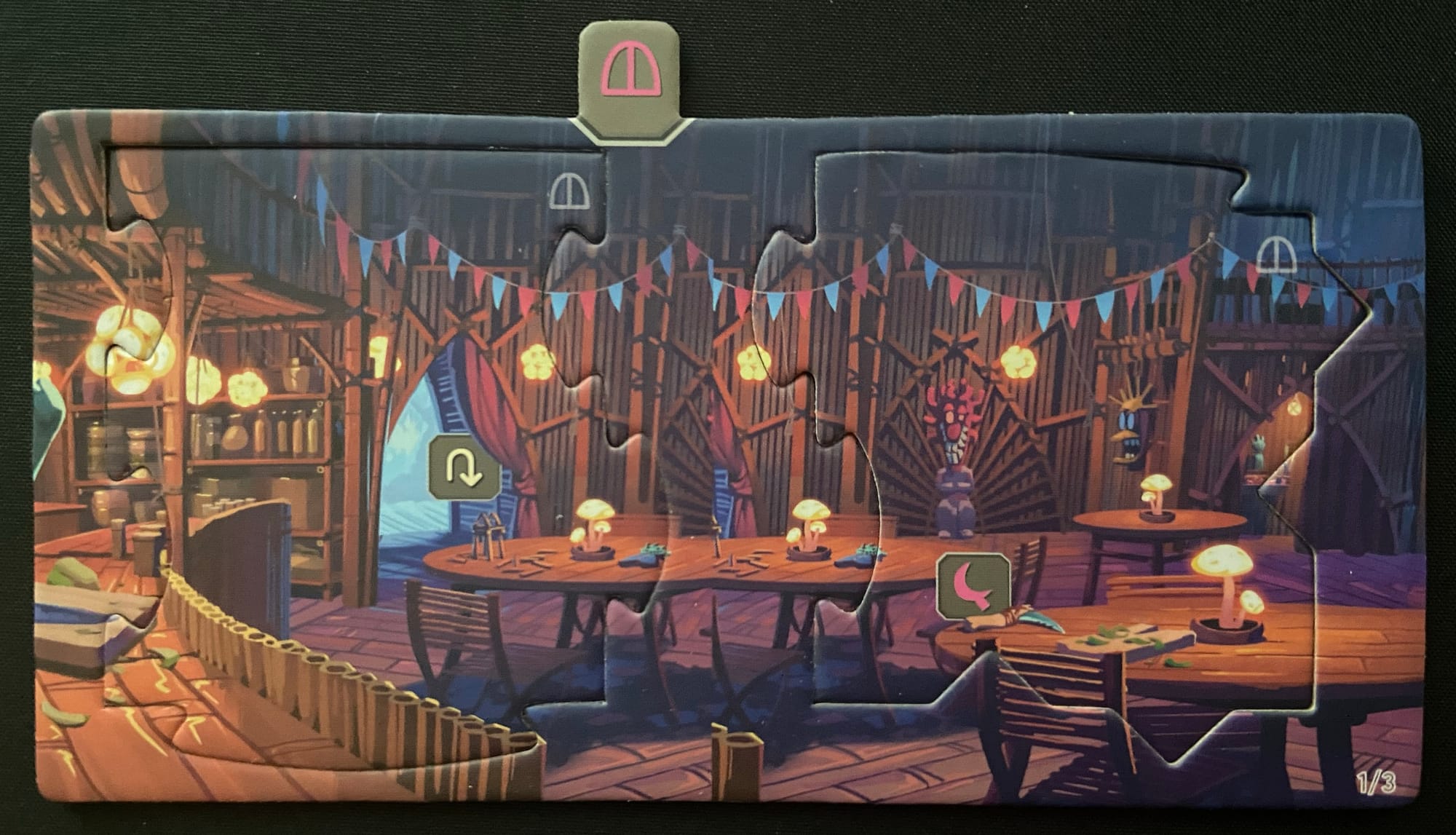 Two puzzle pieces are shown nestled in a cardboard sleeve.