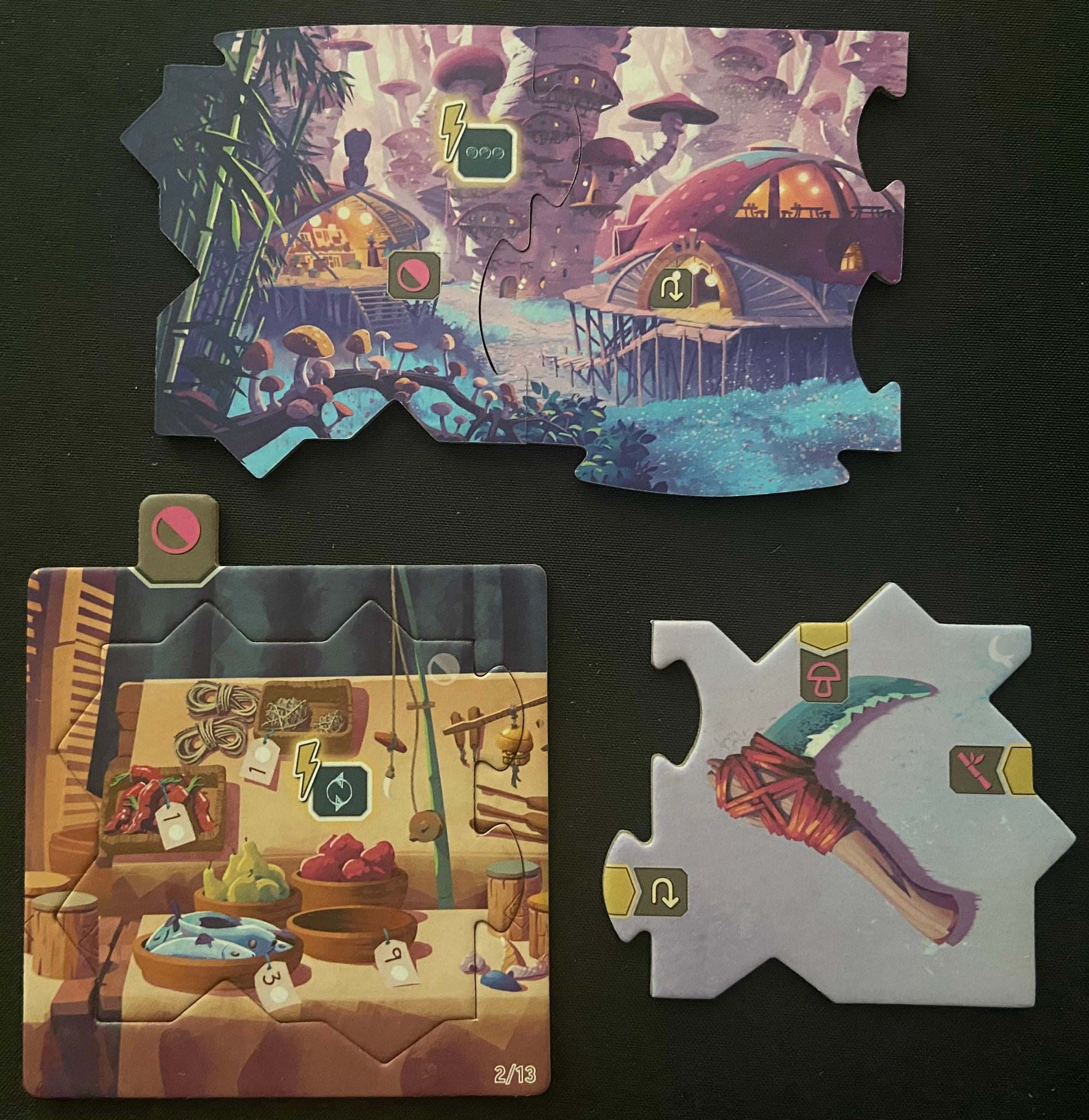 The two puzzle pieces from before are now fit together and flipped over, which revealed another "Take" icon, so a new tile is on the table, showing a shop.. The cutting tool is removed from its sleeve.