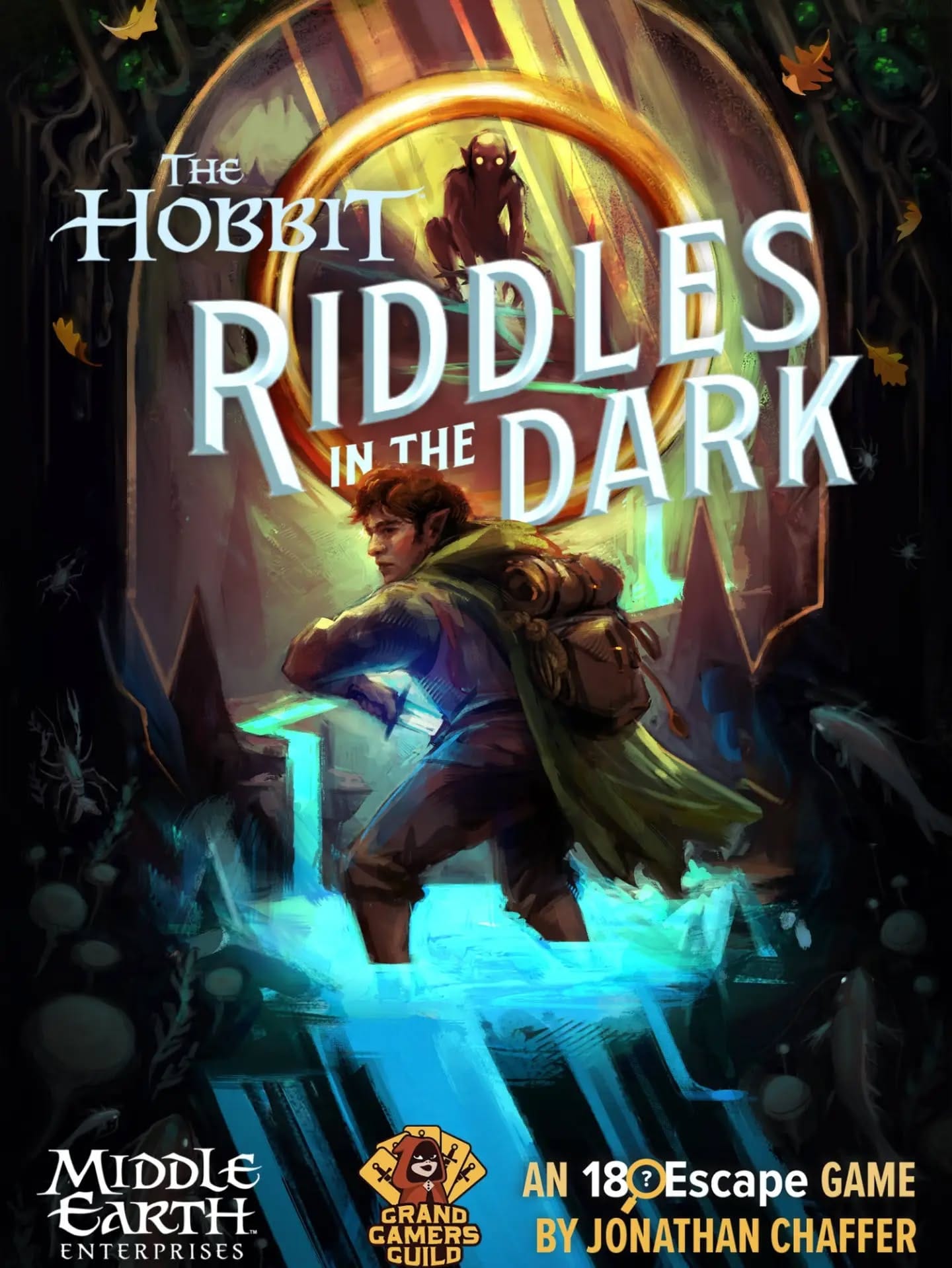 The front cover of The Hobbit: Riddles in the Dark features Bilbo Baggins standing in water and pulling out his sword while Gollum looms in the background, depicted within The One Ring.