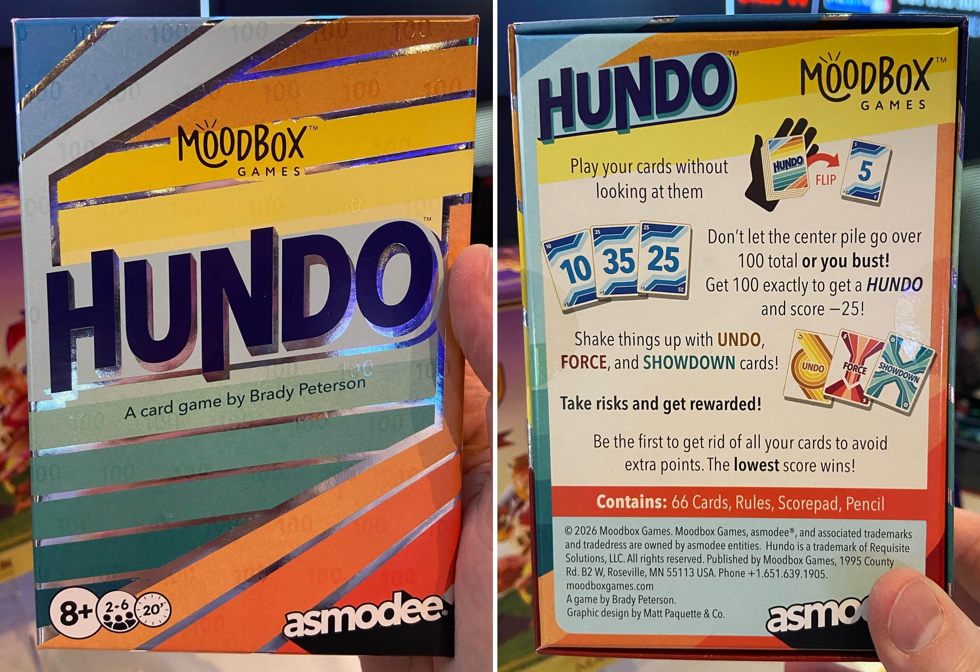 The game box for "Hundo" has bright colored lines on a mirrored background.