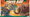 Under the words "Tokyo Bay", a mechanized creature with a warship for a head fires at a squidy kraken being. (This is a detail of the cover of King of Tokyo: Duel – Tokyo Bay.)